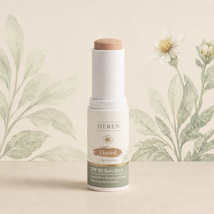 Heren Tinted SPF 50 Sun Stick on a neutral background with floral elements